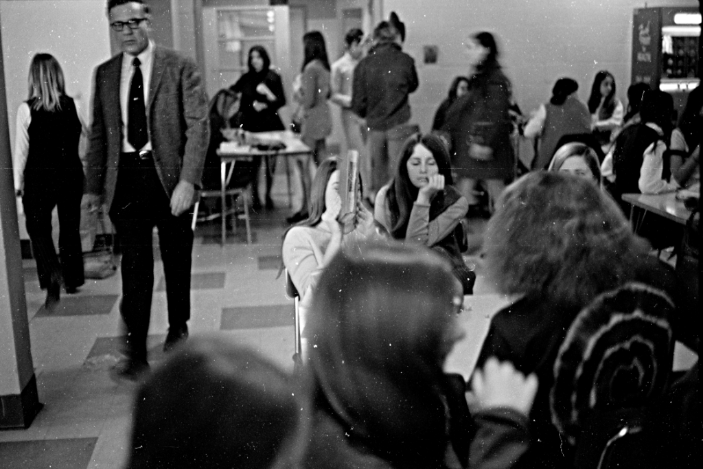 School administrator walking in lunchroom