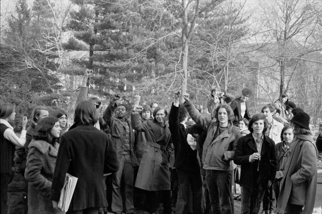 Group at Amphitheater wall giving Power Sign