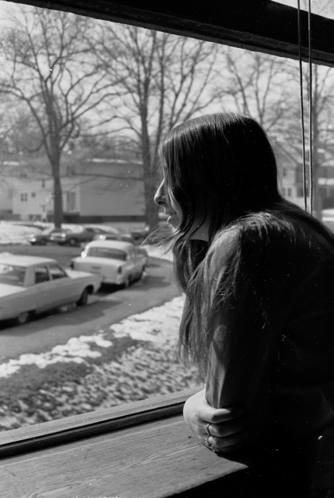 Girl looking out of MHS classroom window