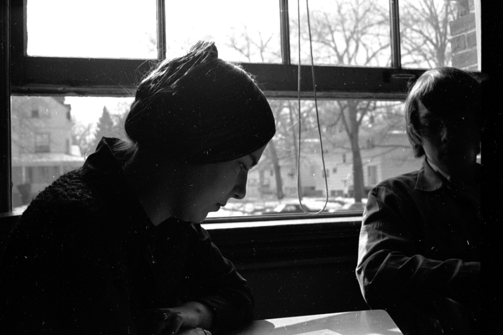 Student sitting near open window