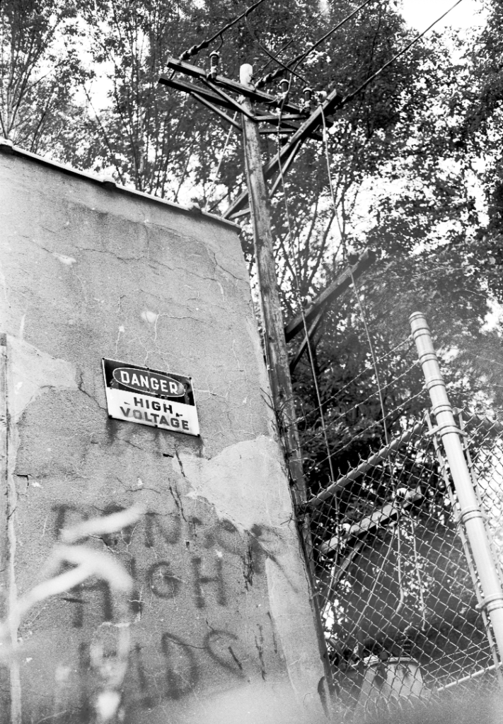 Electric service near Bonds.  Graffiti "Danger High Kids"