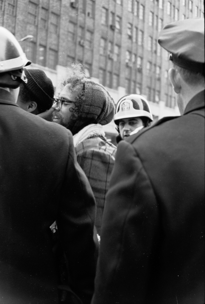 Escort of detainees into police van